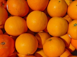 a bunch of frsh oranges
