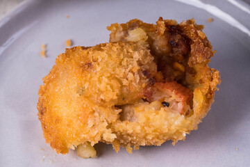 Seafood Korokke or Japanese potato croquettes  are made from mashed potato mixed with ground beef and carrots then deep fried