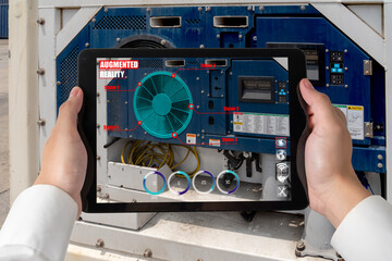 Engineer use augmented reality software in smart factory production line with automated application...