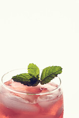 Rose Wine Cocktail with Gin. Topped with Mint.