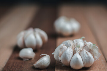 Fresh garlic on the wood background, and food concept