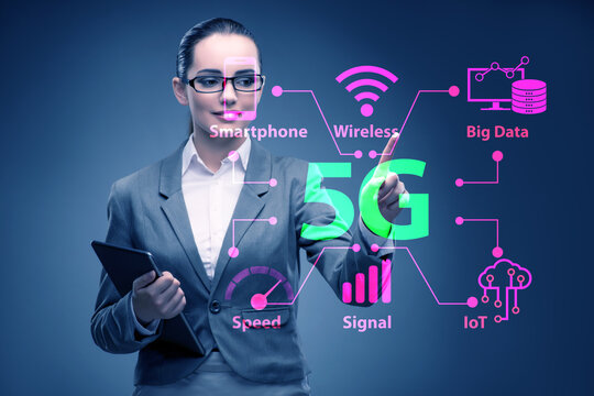 Businesswoman pressing button in 5g concept