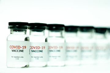 vials of covid-19 vaccine in a row