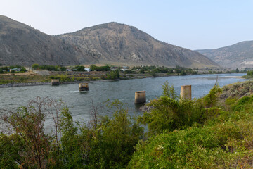 Pilings are all that remain from an old bridge across the Thompson River at Spences Bridge, British...