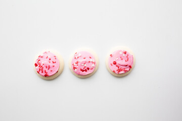 pink and white frosted cookies
