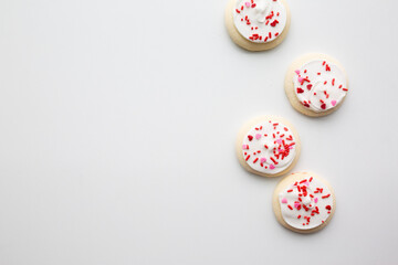 pink and white frosted cookies