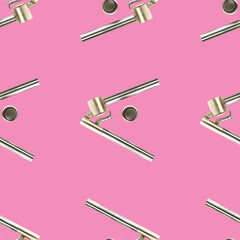 Seamless pattern from garlic press isolated on pink flat lay
