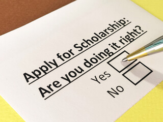 Obraz premium One person is answering question about scholarship application.