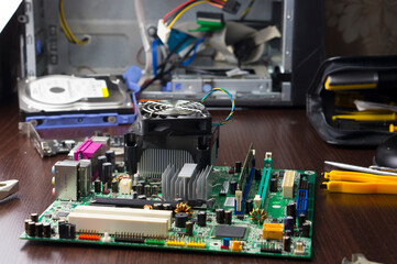 Repair of the motherboard in the service center. Replacing computer parts