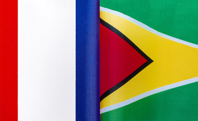 fragments of the national flags of France and the Republic of Guyana close-up