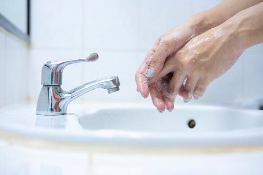 Women's Hands Are Washed With Soap. Hand Hygiene, Skin Care, Disinfection.