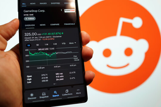 GameStop Corp stock index is seen on a smartphone. GameStop's stock soars as small traders from a Reddit group team up against big institutions. PENANG, MALAYSIA - 31 JAN 2021.        