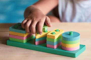 Fototapeta premium boy playing children toys for learning for skills