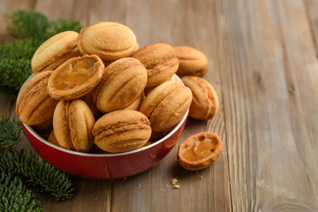 Homemade cookies nuts stuffed with boiled condensed milk. Selective focus. Copy space