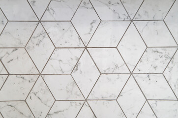 Geometric ornament of rectangles in white marble.