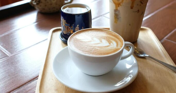 hot coffee cup on table at morning, relax time, latte coffee
