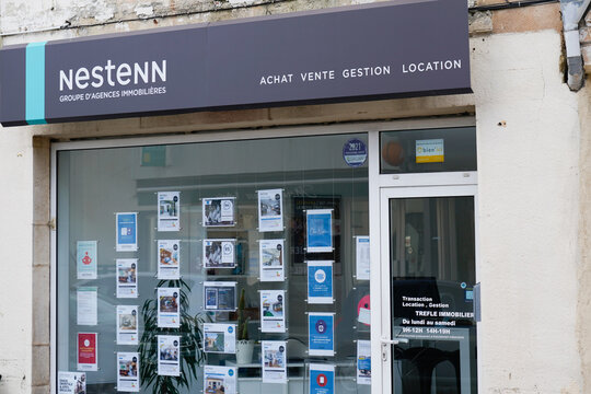 Nestenn sign brand and logo front of building store office on real estate french agency