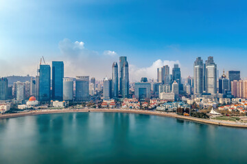 Fototapeta na wymiar A panoramic aerial view of the architectural landscape and skyline of Qingdao Fushan Bay