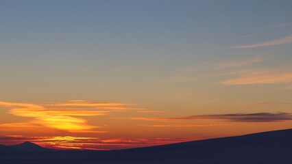 Fototapeta na wymiar Sunset in winter over Jedlová (mountain in the Czech Republic)