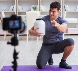 Sports and health blogger recording video in sport concept