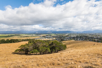 Wither Hills with dry grass above Blenheim town in Marlborough region, South Island, New Zealand