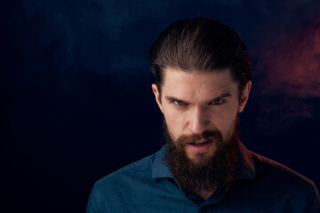 Cute bearded man in shirt elegant style close-up dark background