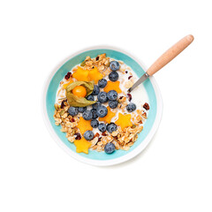 Healthy breakfast. Fresh granola, muesli with milk, honey and berries. Top view. isolated on white background