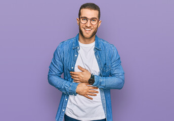 Young caucasian man wearing casual clothes smiling and laughing hard out loud because funny crazy...