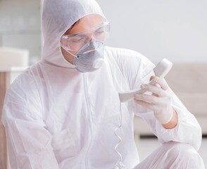 Fototapeta premium Forensic expert at crime scene doing investigation