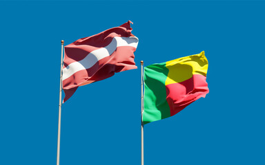 Flags of Latvia and Benin.