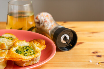 Homemade quiche with organic vegetarian recipes egg broccoli spinach gouda cheddar cheese serving in mini pie tart as a party savory food appetizer
