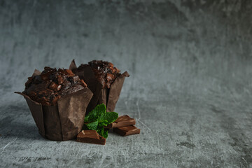 chocolate muffins on a dark background