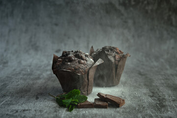 chocolate muffins on a dark background