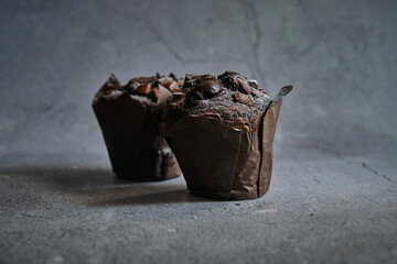 chocolate muffins on a dark background