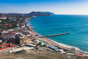 view of the resort town on the beach with the promenade, beaches and piers