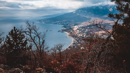 view of the city by the sea from the top of the mountain