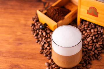 Fresh cafe for refresh caffeine white cup roasted organic coffee bean farm in vintage wood grinder classic metal coffee pot for black espresso and glass cream foam milk cappuccino latte