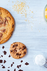 dark chocolate chip cookie round gold concept Organic fresh bake homemade tasty sweet dessert piece of closeup on cookie on wooden table for holiday new year Christmas gift sugar sparkle