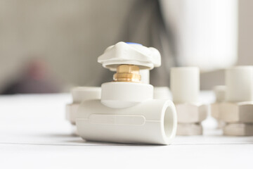 One modern polypropylene water tap with metal coupling isolated on white background