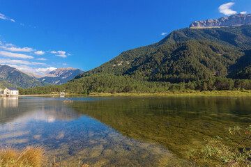 Fototapeta premium Beautiful lake between mountains with reflections in the water
