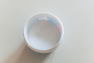 An opened packing of baking soda