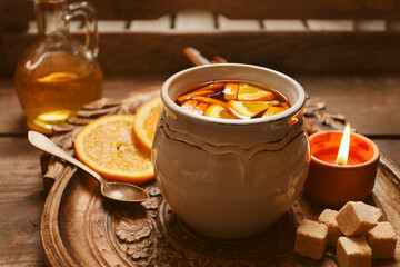 Hot tea with fresh oranges.