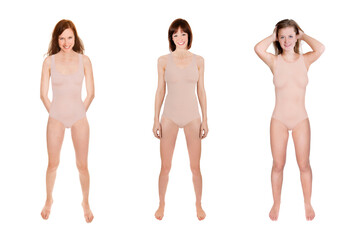 Three cheerful young women wearing beige swimsuits, full length portraits, isolated in front of white background © Jochen Schönfeld