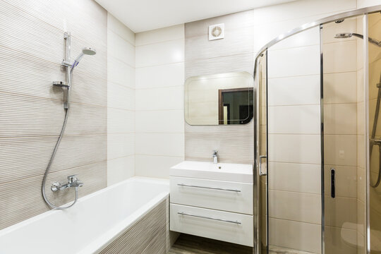 interior photo, bathroom, small with bath and toilet, in white