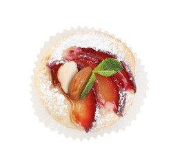 Delicious cupcake with plums isolated on white, top view