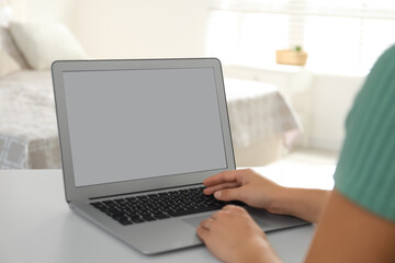 Coworkers working together online. Young woman using video chat on laptop, closeup