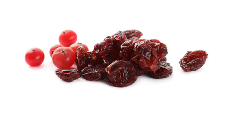 Tasty fresh and dried cranberries isolated on white