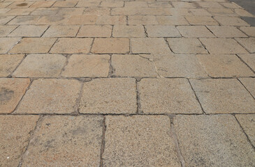 Old Cobblestone pavement closeup.