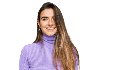 Fototapeta premium Young hispanic woman wearing casual clothes with a happy and cool smile on face. lucky person.