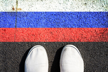 Sneakers and the Russia flag. View from above.